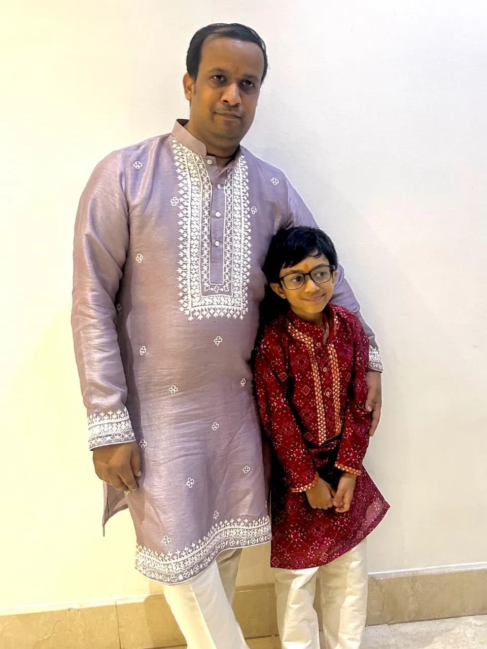 Father and son in embroidered kurtas