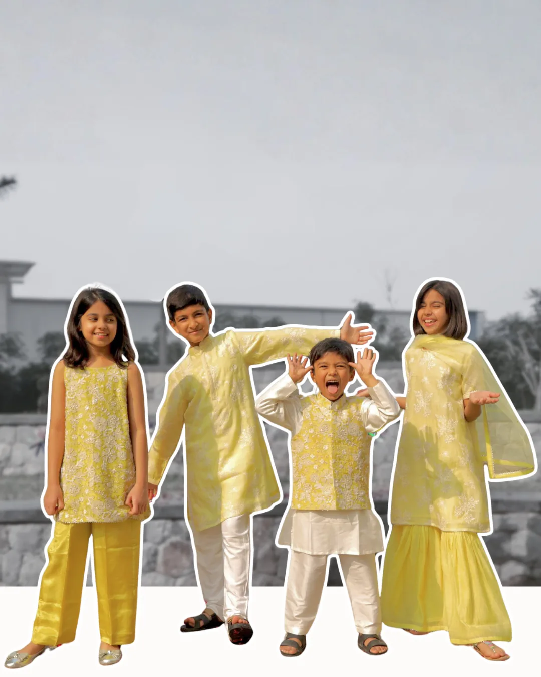 Four children in yellow embroidered Taber Tikri festive outfits